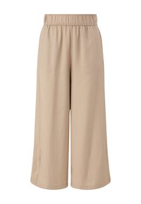 Beige Culottes mit elastischem Bund, weitem Bein und weichem Stoff. Sie verfügen über seitliche Taschen und eine glatte Textur.
