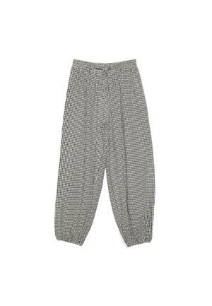 Luźne czarno-białe spodnie w kratkę gingham z elastycznym pasem i elastycznymi ściągaczami, ułożone na płasko na białym tle.