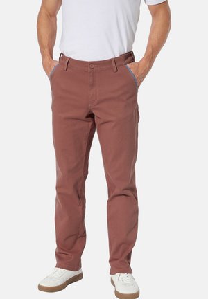 Braune Baumwollhose mit einer glatten Textur und geradem Schnitt. Verfügt über Standardtaschen und kontrastierendes blaues Nähen am Bund.