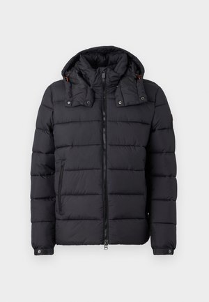 Black quilted puffer jacket with detachable hood, full front zipper, zippered side pocket, and snap button cuffs on a white background.