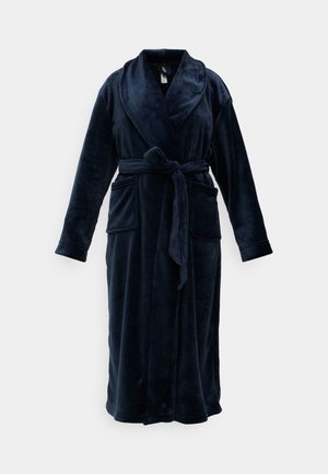 Ναυτικό μπλε φλις ρόμπα με μακριά μανίκια, γιακά σαλονιού, ζώνη στη μέση και δύο μπροστινές τσέπες. Απαλή υφή και σχέδιο πλήρους μήκους.