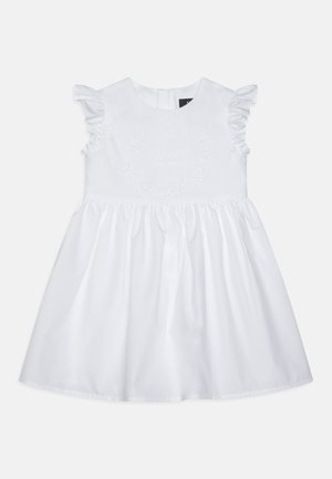 White dress with ruffled sleeves, embroidered brand name and year, flared skirt, made from lightweight fabric with a smooth texture.