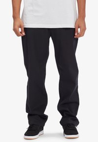 DC Shoes - WORKER RELAXED - Pantaloni - black Immagine in miniatura 1