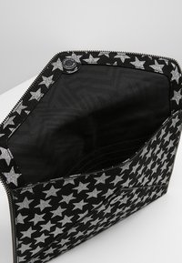 Rebecca Minkoff Psaníčko - black
