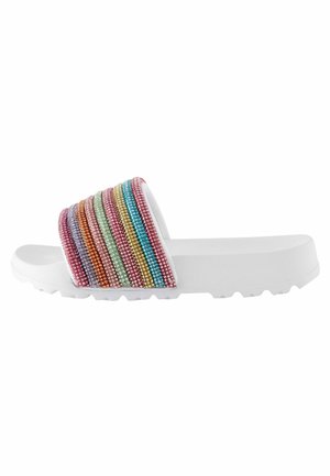 White slide sandal with a thick sole and a strap adorned with horizontal rainbow-colored rhinestone stripes.
