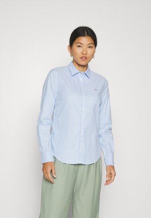 SLIM SHIRT - Button-down blouse - light blue
