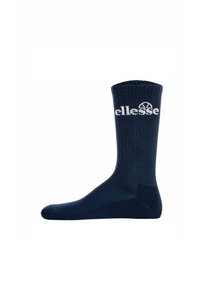 Calzino blu navy lungo fino alla caviglia realizzato in tessuto a costine con un logo bianco sul risvolto. Tessuto liscio con punta e tallone rinforzati.