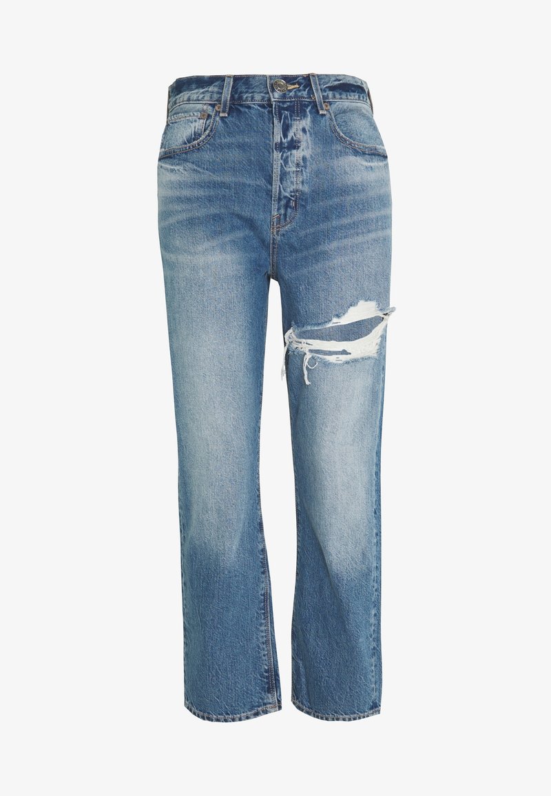 Jean en denim bleu clair avec une coupe décontractée, présentant une déchirure usée au genou, un design classique à cinq poches et une fermeture à bouton.