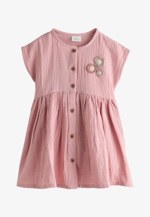 Rosa kurzärmeliges Baby-Kleid mit Knöpfen vorne und drei kleinen gehäkelten Blumen auf der Brust.