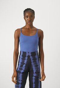 Yogasearcher Top - pavot