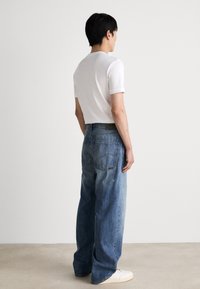 G-STAR TYPE - Løst sittende jeans - antique faded penida blue