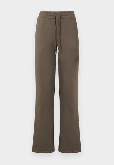 Καφέ φαρδιά φόρμα με ελαστική μέση, ρυθμιζόμενο κορδόνι και διακριτική κεντητή λεπτομέρεια στο πάνω αριστερό μηρό.