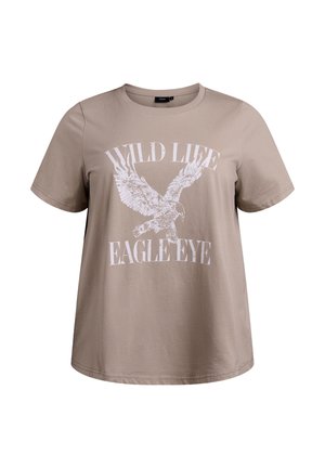 T-shirt en coton beige avec des manches courtes et un col rond. Le graphisme à l'avant représente un aigle avec le texte "WILD LIFE EAGLE EYE" en blanc.