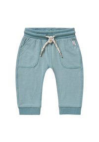 Lichtblauwe katoenen sweatpants met een geribbelde tailleband, verstelbaar trekkoord en twee zijzakken. Heeft enkelboorden en platte naden.