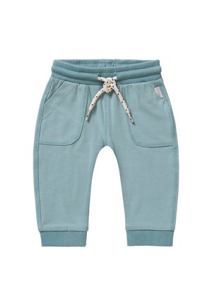 Helle blaue Sweatpants aus Baumwolle mit einem gerippten Bund, verstellbarem Kordelzug und zwei seitlichen Taschen. Sie verfügen über Bündchen an den Knöcheln und flache Nähte.