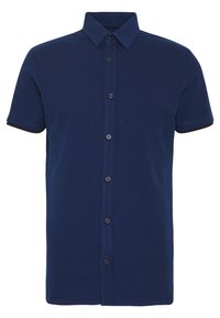 Camicia a maniche corte blu navy con bottoni, realizzata in tessuto dalla texture liscia. Dotata di colletto e rifiniture nere sulle maniche.
