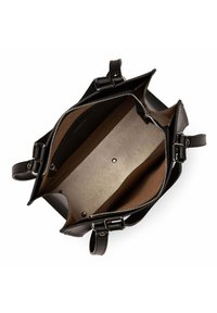 Sac à main en cuir noir avec une fermeture éclair ouverte, mettant en valeur un intérieur beige avec un design texturé, deux compartiments et une fermeture à pression magnétique.