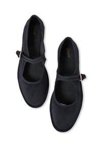 Black suede ballet flats with a round toe and T-strap design. Features a small gold-tone buckle. Soft texture and cushioned interior.