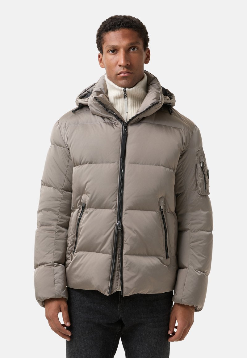 Polstret hættejakke i lysegrå med sorte lynlåse, sidelommer og ribbet krave. Har en struktureret, glat overflade.