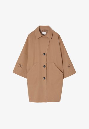 Beige Oversized-Jacke mit klassischem Kragen, vier Vorderknöpfen, zwei großen Taschen und kurzen Ärmeln mit verstellbaren Manschetten.