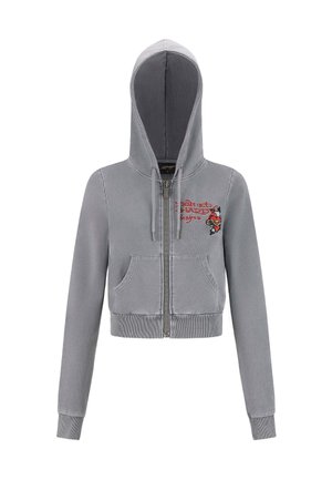 Felpa grigia corta con zip e tasche frontali, con cordini e testo rosso "Ed Hardy designs" accompagnato da una grafica di una rosa sul petto.
