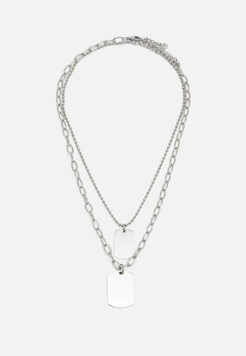 Silver layered necklace with two chains: one ball chain and one link chain. Features two blank dog tag pendants. Smooth metal texture.