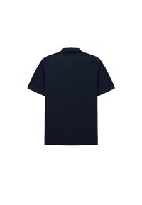 Mørkeblå kortærmet polo t-shirt med ribbet overflade og klassisk krave. Rent design uden synlig branding eller accenter.