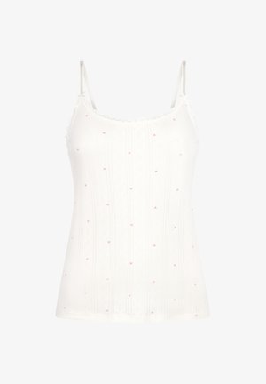 Witte cami met fijne kanten rand, voorzien van een geribbelde structuur en kleine roze hartjespatronen overal. Verstelbare spaghetti bandjes.