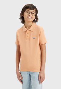 Levi's® BACK NECK TAPE  - Pólóing - peach bloom