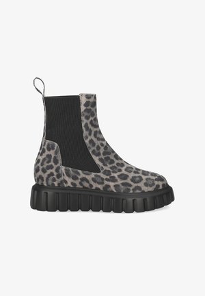 Leopard print ankle boots in gray and black suede, featuring elastic side panels and a thick black rubber sole with a ribbed texture.
