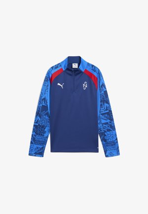 Haut de performance à manches longues marine avec une manche à motifs bleus, des accents rouges et un col zippé. Présente un logo blanc sur la poitrine.