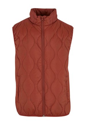 Gilet senza maniche trapuntato di colore ruggine con colletto alto e zipper centrale; presenta cuciture ondulate e tasche laterali.