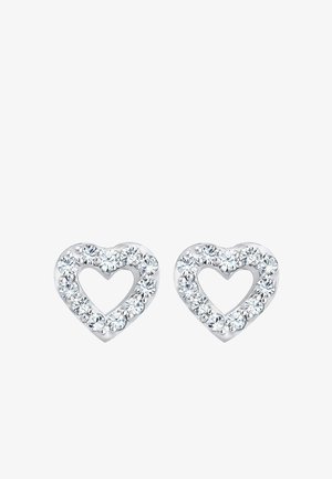 Silberfarbene herzförmige Ohrringe mit klaren Strasssteinen am Rand und einem hohlen Zentrum, das eine glänzende, glatte Oberfläche zeigt.