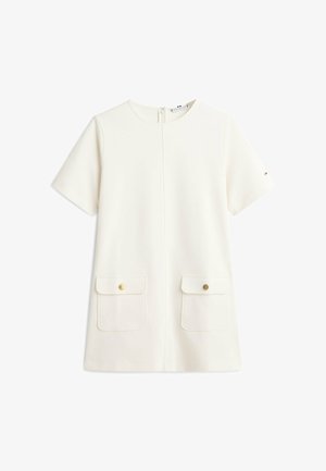 White short-sleeve dress with round neckline, front zipper, and two flap pockets with gold buttons near the hem.