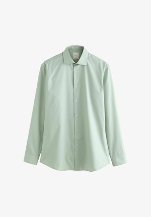 Hele-roheline pika varrukaga särk, mis on valmistatud siledast kangast, omades klassikalist kraed ja eest nupukinnitusega, kus nupud on kaetud samast kangast ja ühtlaselt paigutatud.