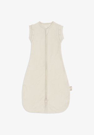 Gigoteuse pour bébé en crème avec design sans manches, fermeture éclair à l'avant et boutons pression aux épaules pour un habillage facile.