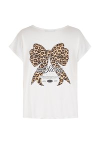 T-shirt blanc avec un grand nœud imprimé léopard et le texte « Assumez votre histoire », accompagné d'un message motivationnel plus petit en dessous.