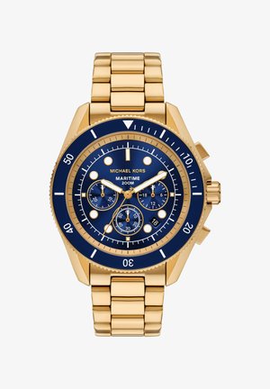 Het Michael Kors Maritime horloge heeft een gouden roestvrijstalen band, een blauwe wijzerplaat, gouden accenten, drie subdials en een roterende lunette met minutemarkeringen.