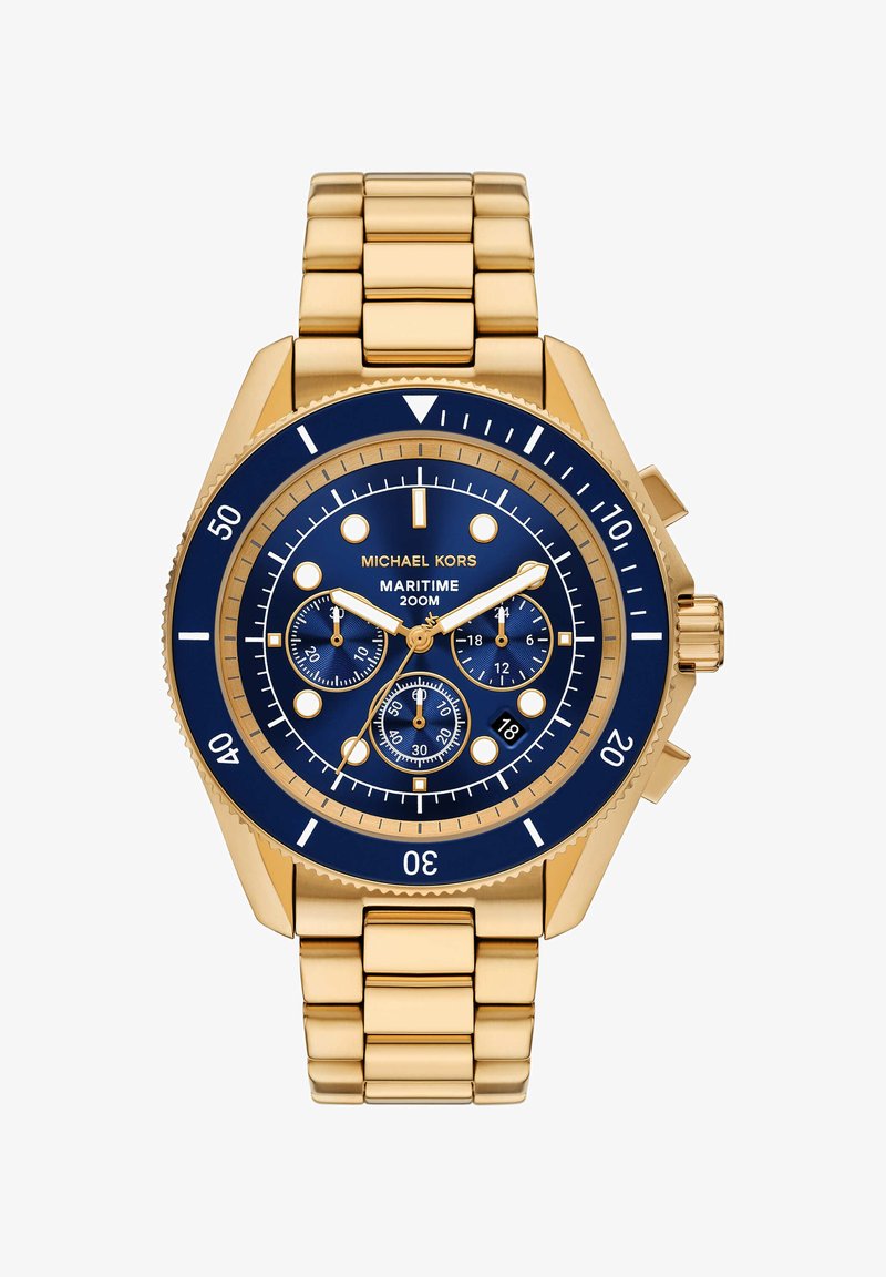 El reloj Maritime de Michael Kors presenta una correa de acero inoxidable dorado, una esfera azul, acentos dorados, tres subesferas y un bisel giratorio con marcadores de minutos.