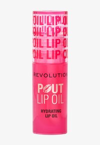 Transparent rosa sylinderformet beholder med fet rosa og gull tekst. Har en skrulokk. Produktet er merket som "Hydrerende leppeolje."