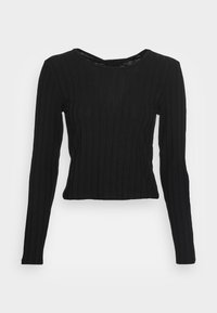 Top preto de mangas longas com textura canelada, design ajustado e decote barco. O tecido é suave e ligeiramente elástico.