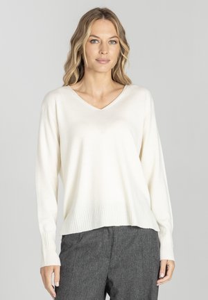 - Sweter