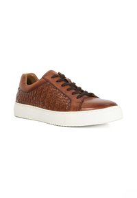 Brown leather sneaker with woven texture on the side, dark laces, white rubber sole, and rounded toe.