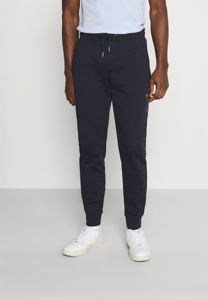 Tommy Hilfiger ESSENTIAL Tracksuit bottoms desert sky/dark blue