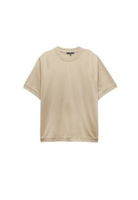 Beige kortærmet sweatshirt med rund hals, raglanærmer og blød tekstur. Simpelt design med synlige sømme langs kanten.