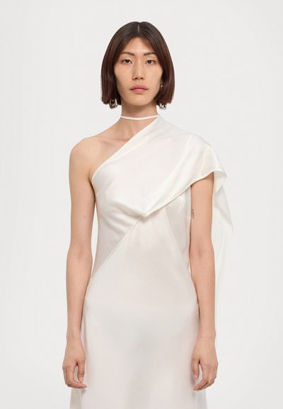 One-shoulder white satin dress with a flowing drape, featuring a subtle sheen and a fitted silhouette. Minimalist design with soft textures.