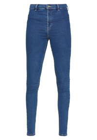 Korkeavyötäröiset siniset farkkutrikoot, joissa on sileä pinta, kapenevat lahkeet ja näkyvät saumat. Metallinen nappisulku vyötäröllä.