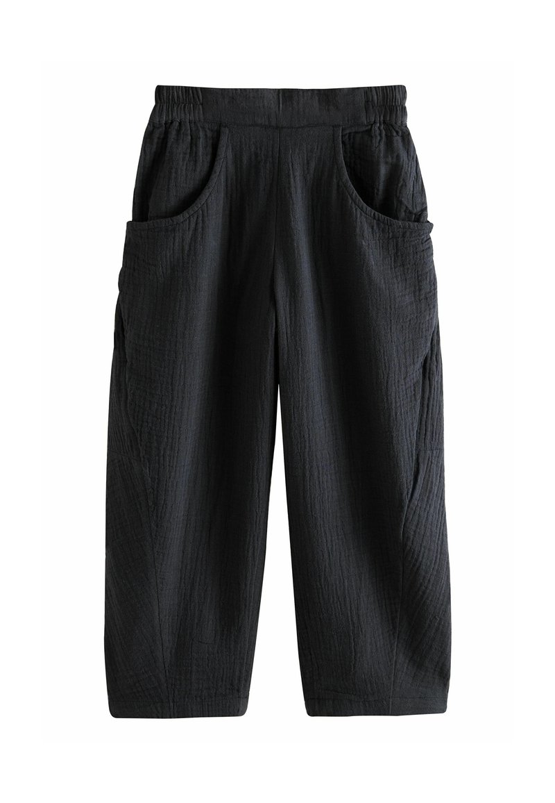 Pantalons noirs à jambe large, texturés, avec une taille élastique et deux poches latérales. Fabriqués dans un tissu doux, avec des lignes verticales subtiles.