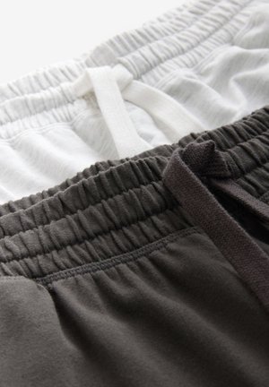 Two pairs of elastic waistband shorts in light gray and dark gray cotton, featuring drawstrings and a soft, textured finish.