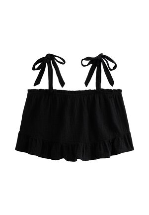 Crop top noir en tissu texturé, avec des bretelles réglables à nouer et un ourlet volanté pour un détail supplémentaire.